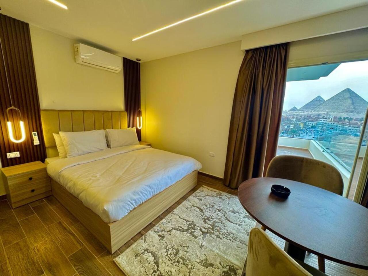 Rotana Pyramids View Hostel Nazlet el-Sîsi Buitenkant foto